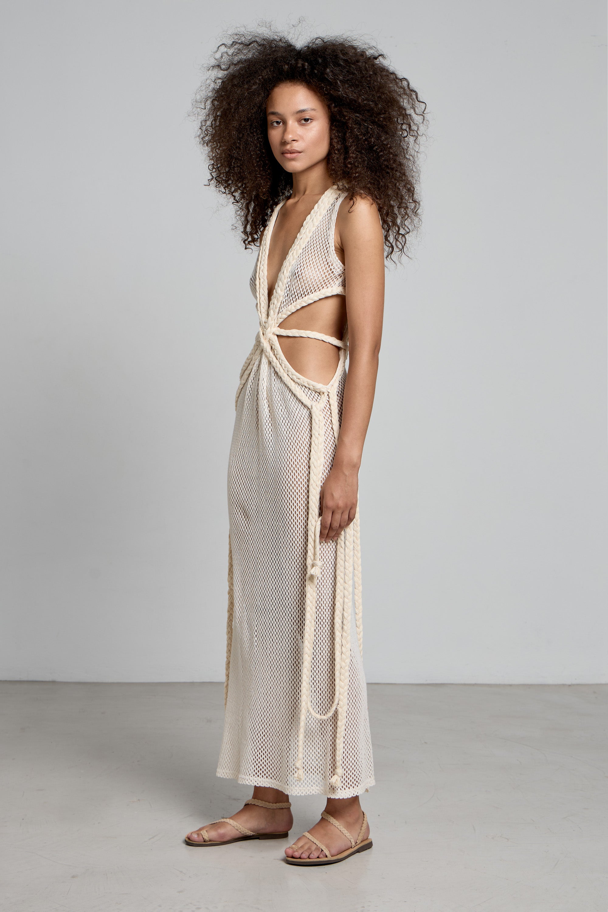 rihanna maxi dress Rihanna Embraces Sweater Weather In a Knit Maxi Dress and Thigh-High Boots